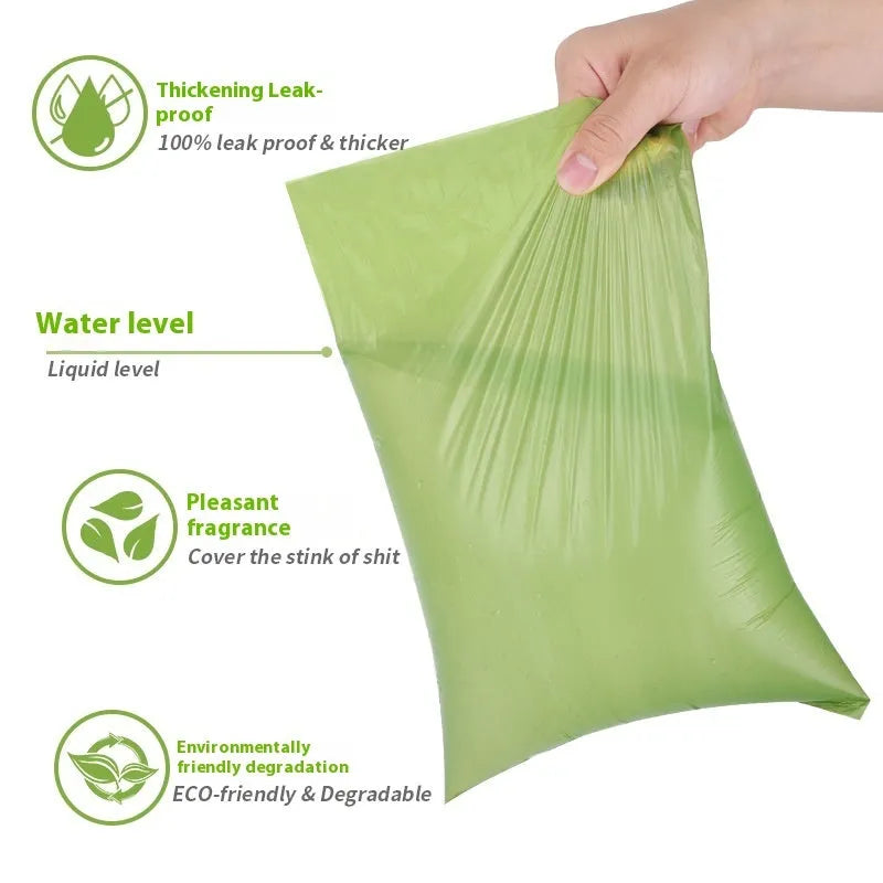 Rolls of green, black, blue, purple and orange degradable pet poo bags with a portable dispenser
