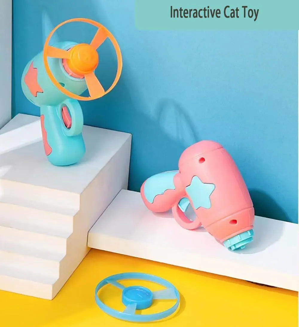 Blue plastic cat toy gun with rotating Frisbee launcher measuring 11cm tall for indoor cat play
