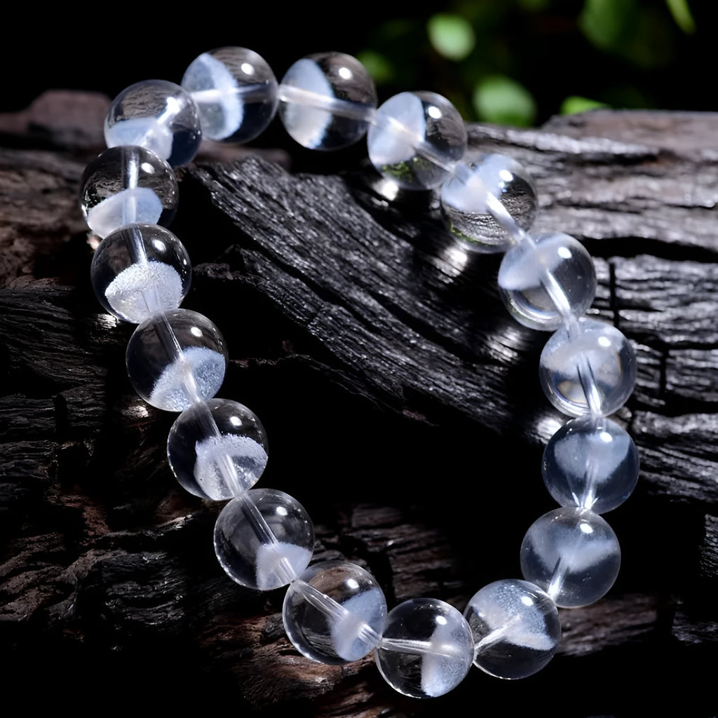 Women's white crystal pyramid bracelet with Ruyi design elements showing pyramid shapes and adjustable sizing