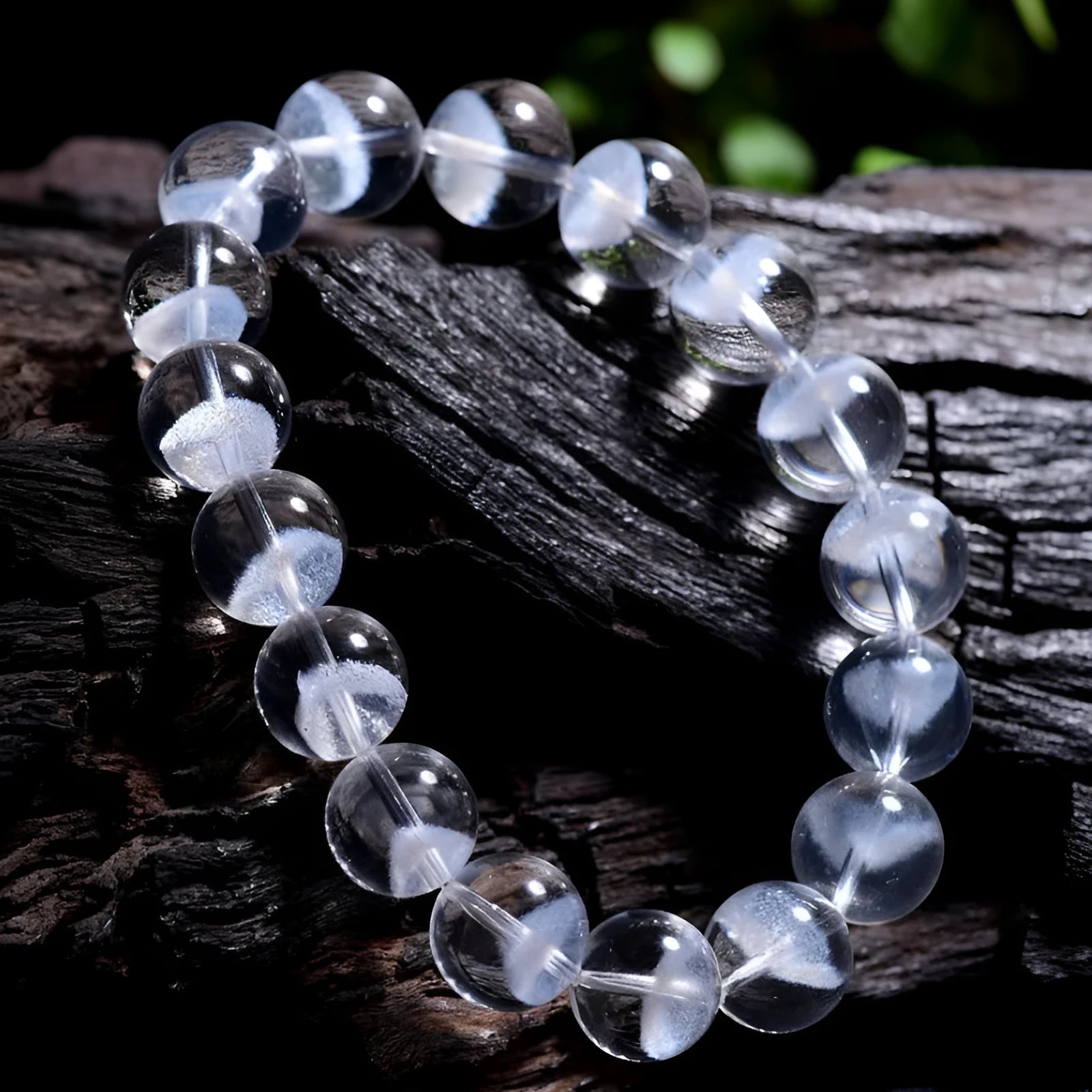 Women's white crystal pyramid bracelet with Ruyi design elements showing pyramid shapes and adjustable sizing