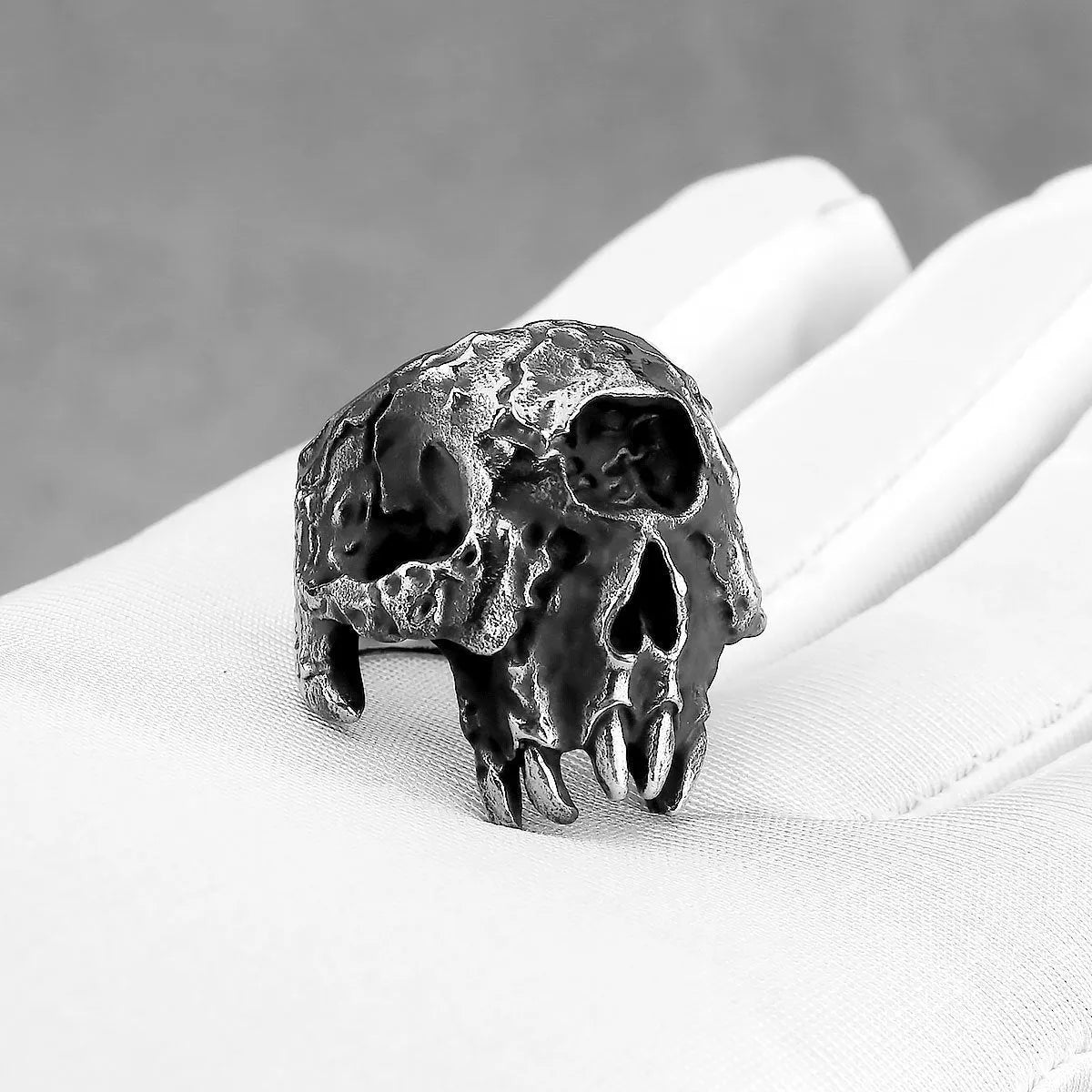 Electroplated alloy skull ring showing one-eyed design on finger, retro punk hip hop style