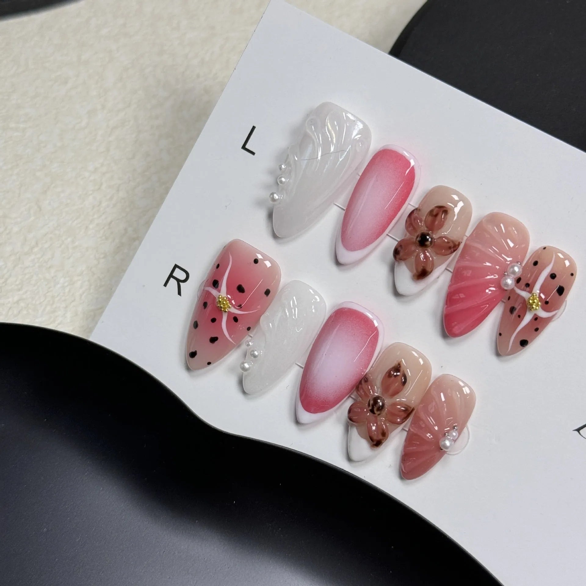 Hand-painted 3D carved nail patches showing embossed candy patterns in colourful designs.