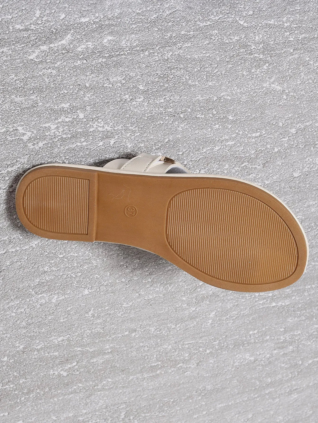 Women's flat heel leisure slippers in artificial PU, cream-white colour, with metal and leather stitching detail, side view