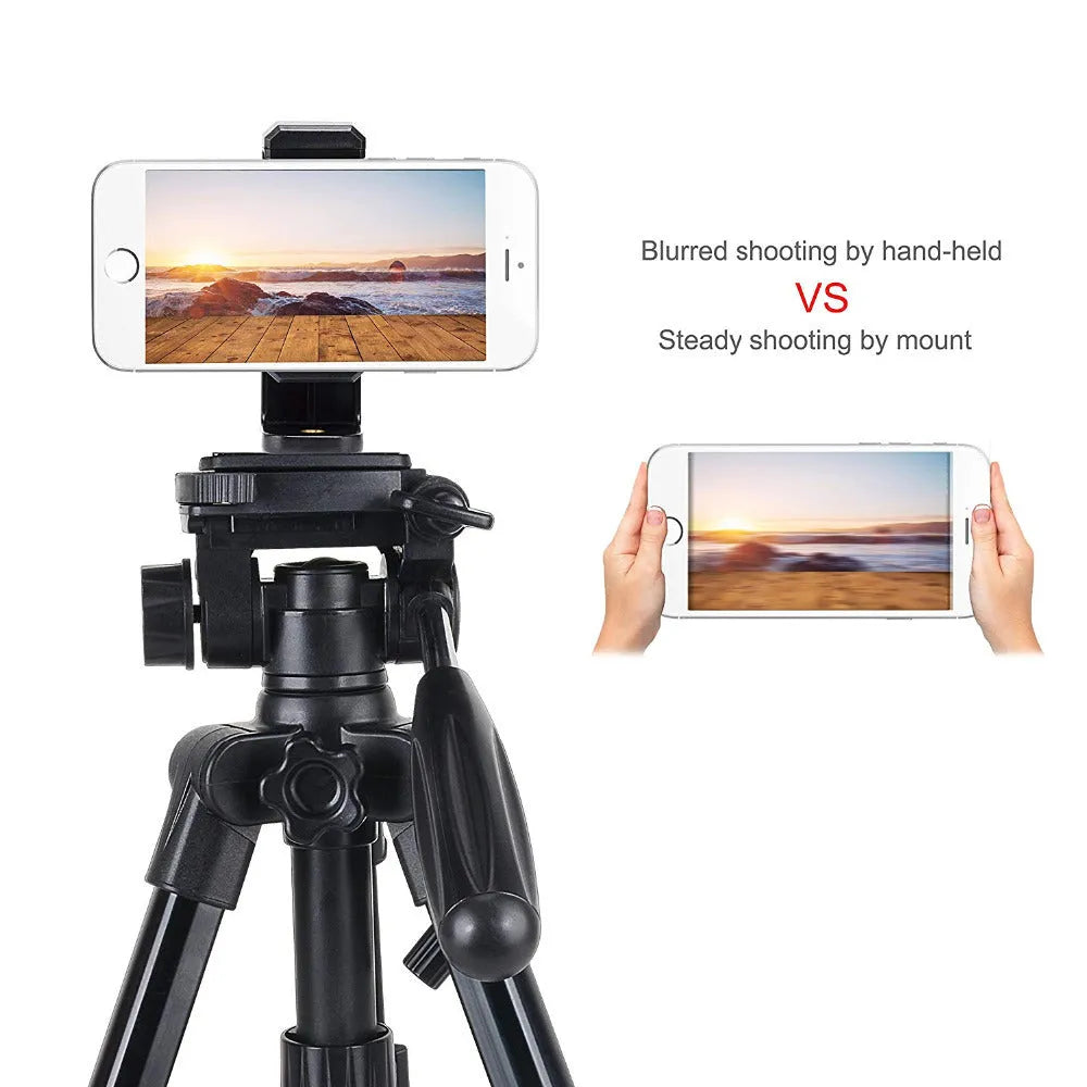 Black plastic rotating clamp phone holder on a desk, showing compact size and adjustable angle.