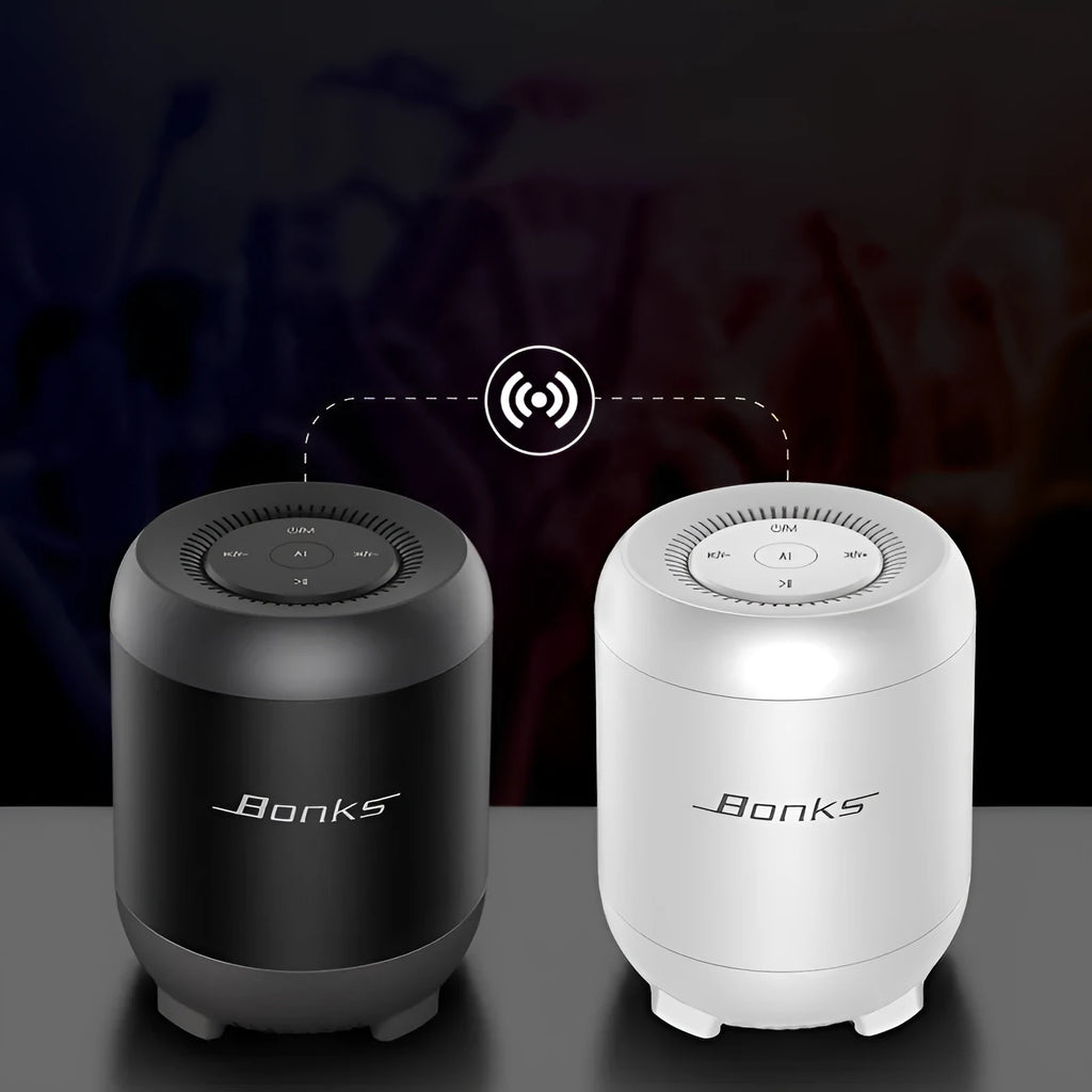 Black and white Bluetooth speaker with AI voice control showing button interface