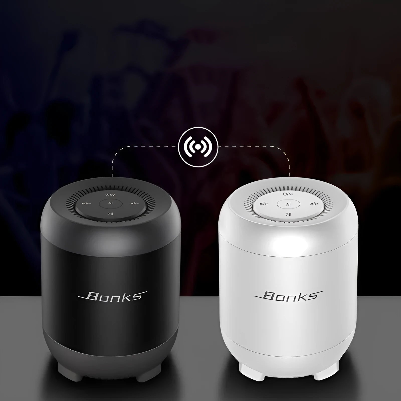 Black and white Bluetooth speaker with AI voice control showing button interface