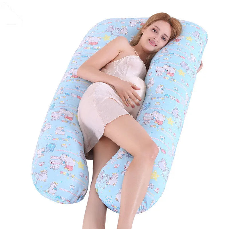 Large U-shaped pregnancy support pillow with removable cover in choice of fabrics.