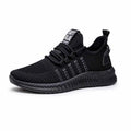 Men's black flying weave sports shoes with cross strap design and round toe