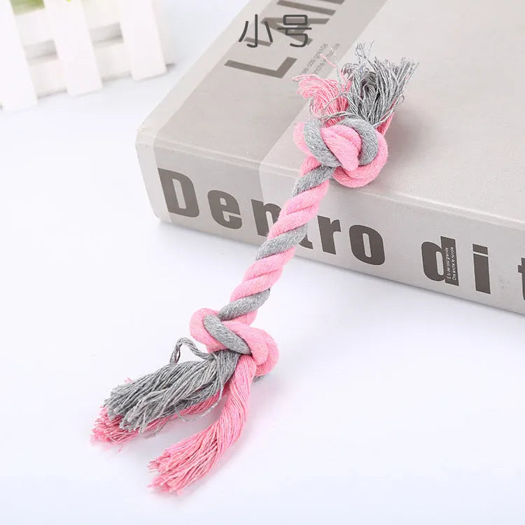 Cotton rope dog toy in medium size with braided texture, available in green, light blue, navy blue, pink, and yellow