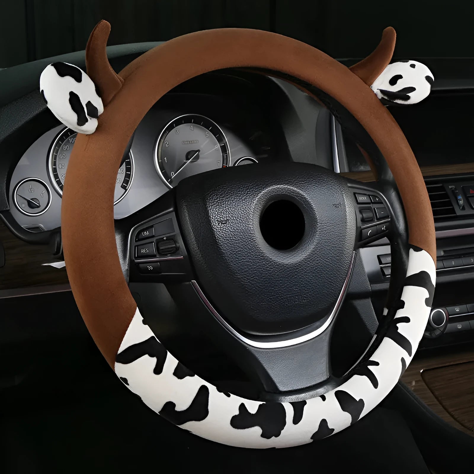 Short plush car steering wheel cover with protective handle in black colour showing 38cm diameter measurement
