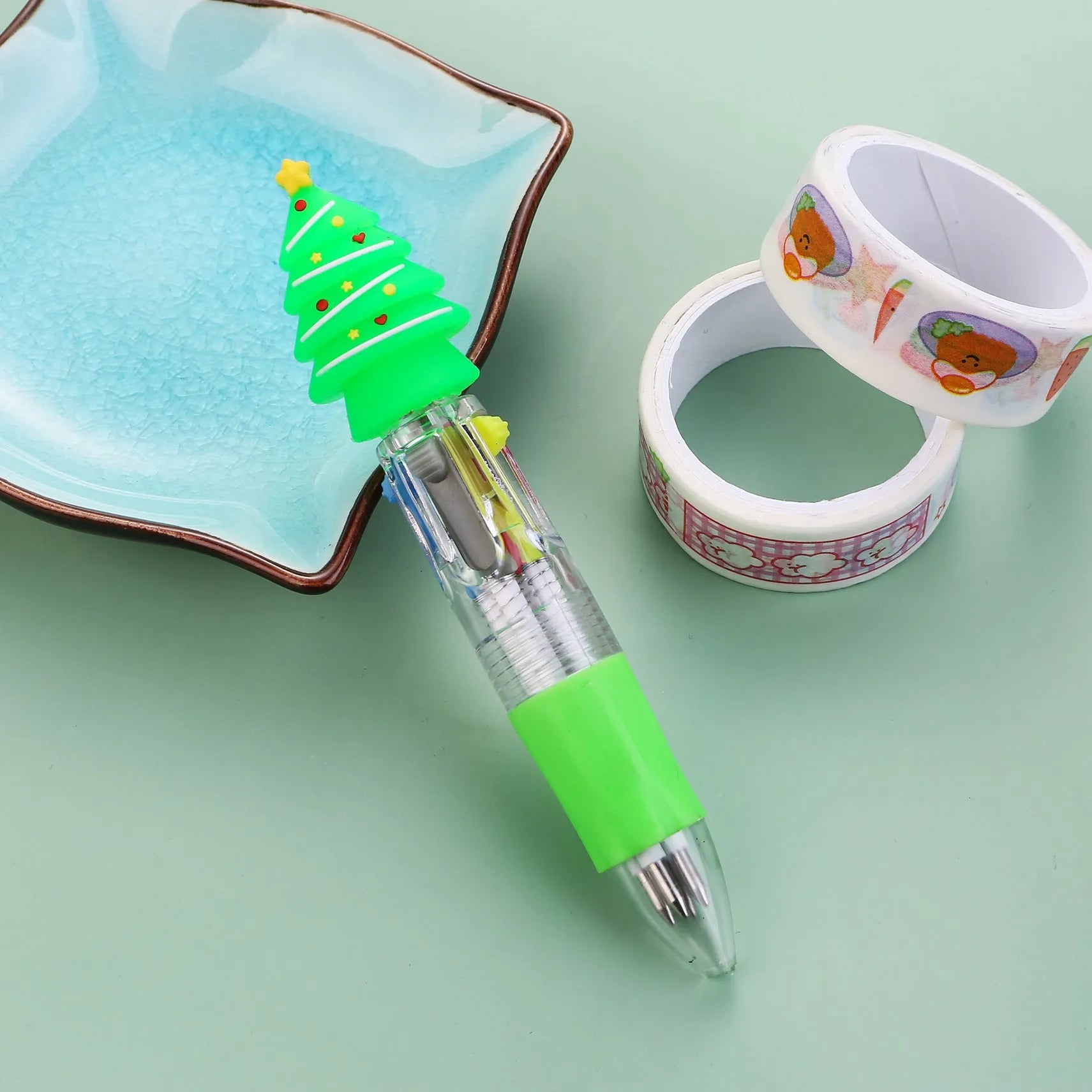 Compact 11cm Christmas four-colour ballpoint pen with press mechanism in festive designs