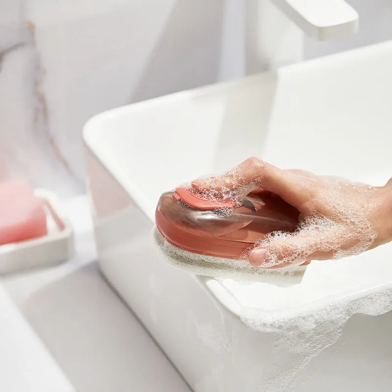 Automatic liquid cleaning brush for shoes and clothes with ergonomic grip in selected colour