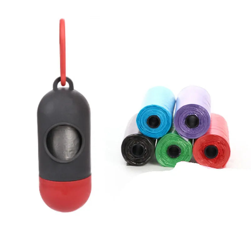 Roll of coloured disposable pet waste bags showing black, blue, green, light blue, pink, and purple options.