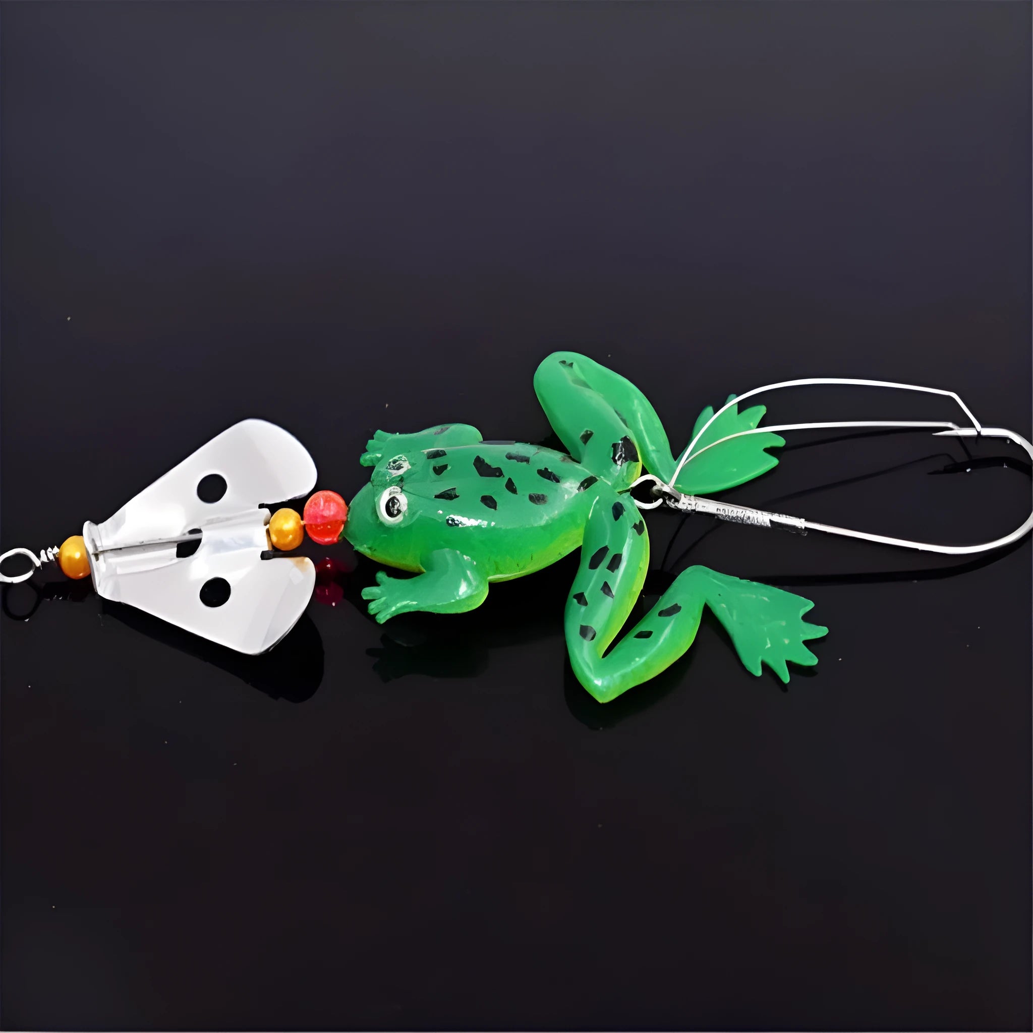 Frog-shaped fishing lure with revolving sequins and anti hanging bottom hook, 6.2g, on a white background