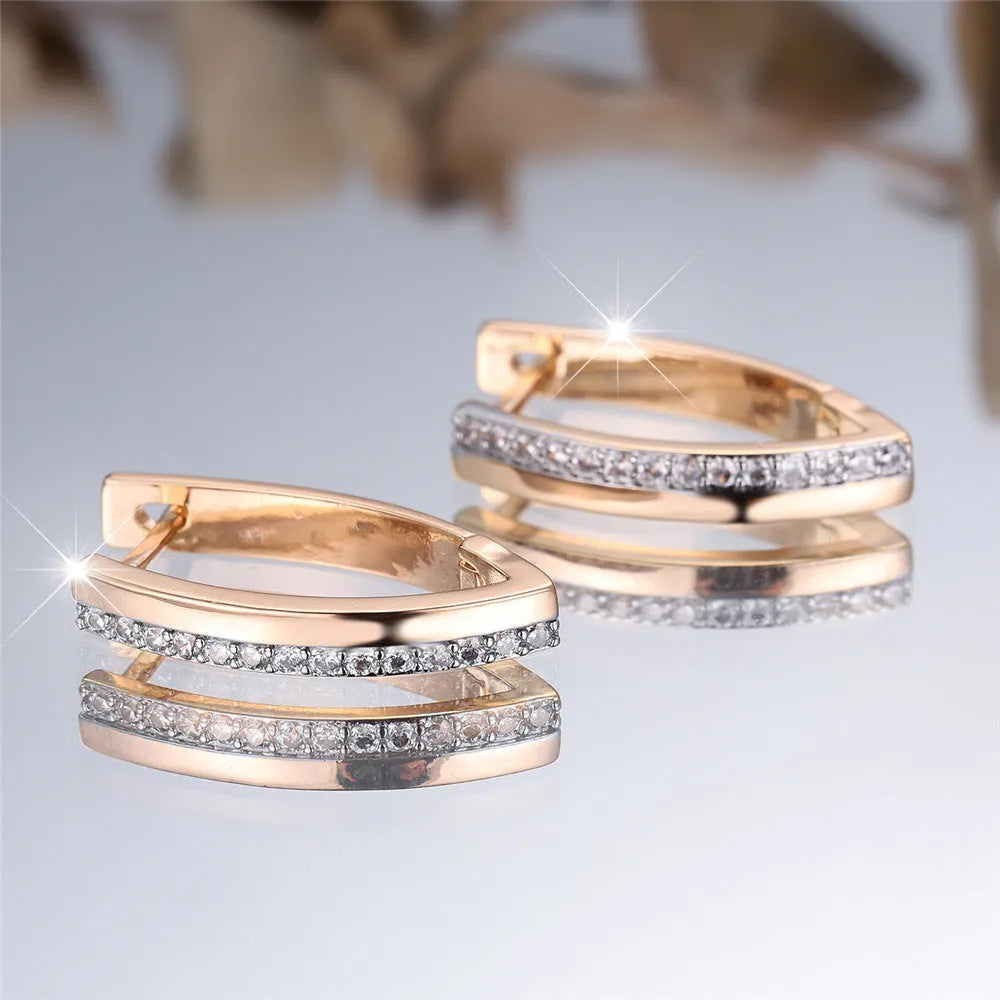 Women's V-shaped geometric ear clips with champagne gold electroplating and white diamond accents