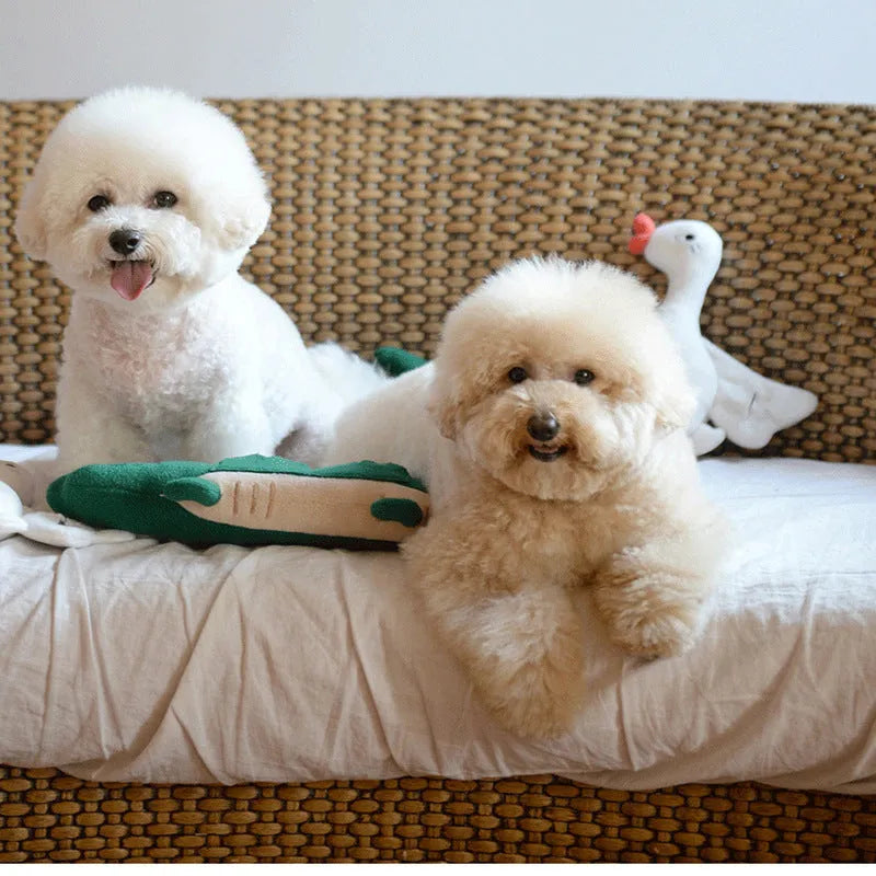 Green plush toy dog interactive pet toy measuring 35cm by 18cm