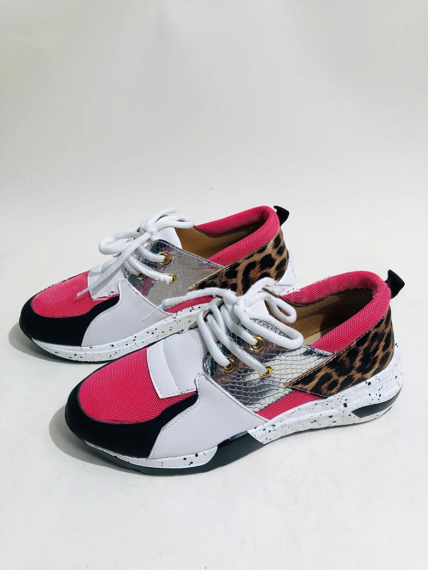Women's suede casual sneakers with wedge heel in leopard print and snake pattern designs