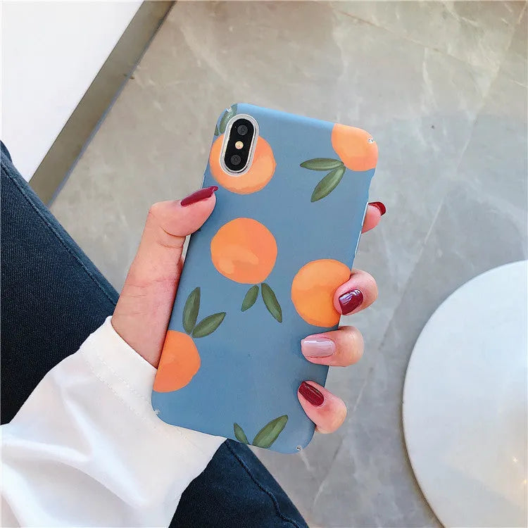 Orange plastic iPhone case with retro-style water and blue background design.