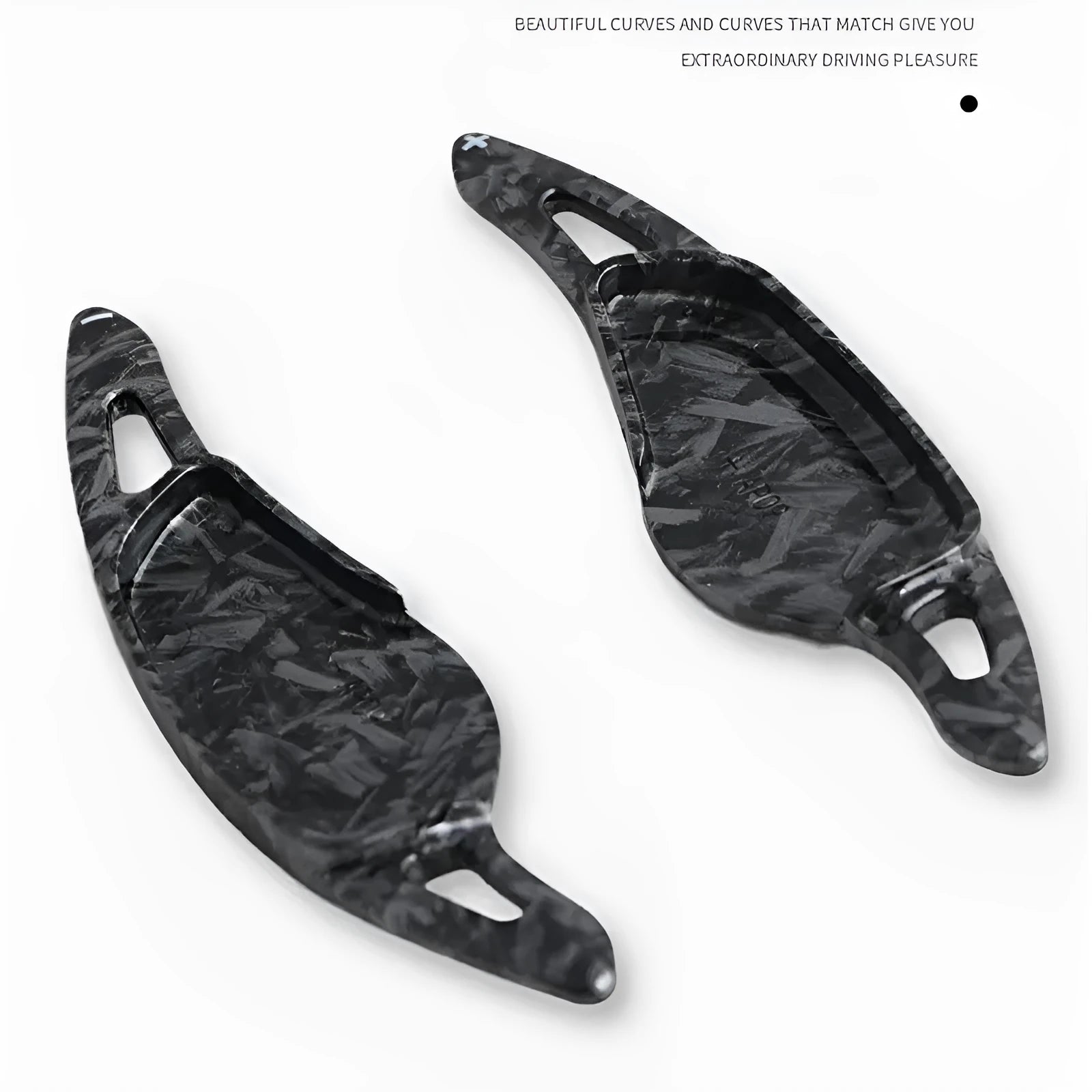 Steering wheel paddle shifter modification kit with carbon fibre pattern on black background