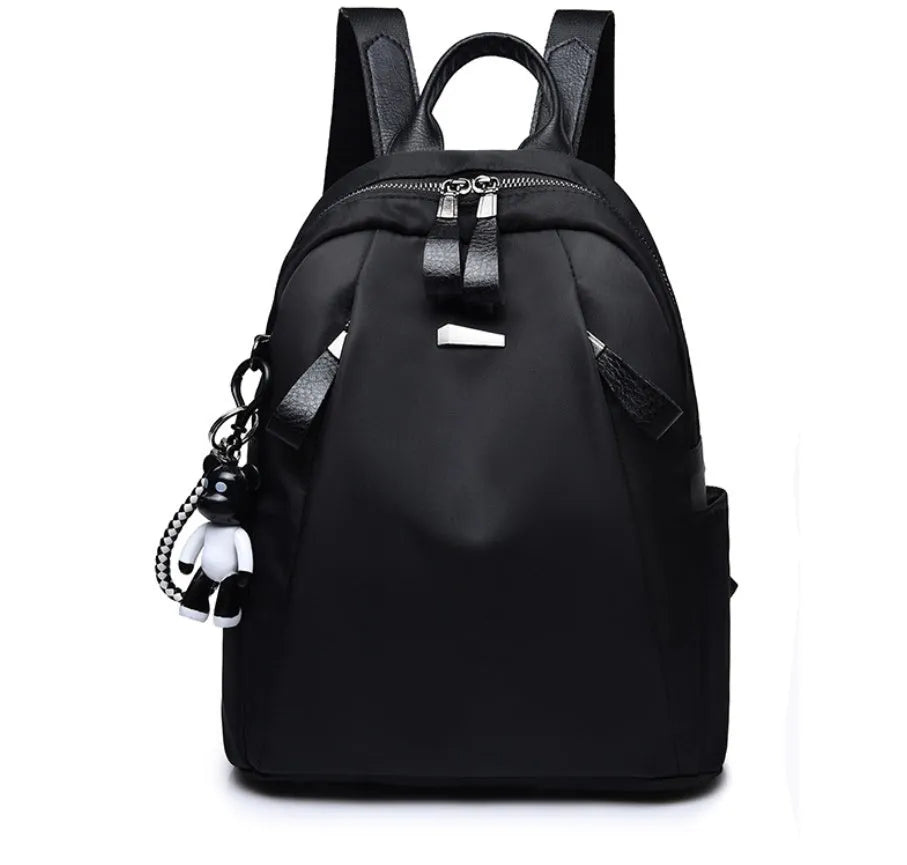 Medium wild fashion rucksack in Oxford cloth with vertical square shape, double straps, and zipper closure available in black, gray and wine red