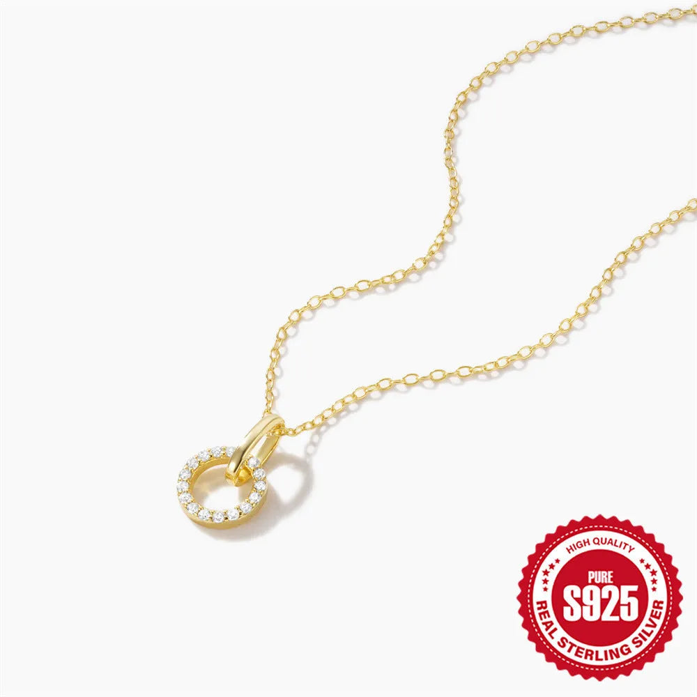 Gold colour geometric sterling silver necklace with interlocking design and zircon details on adjustable chain