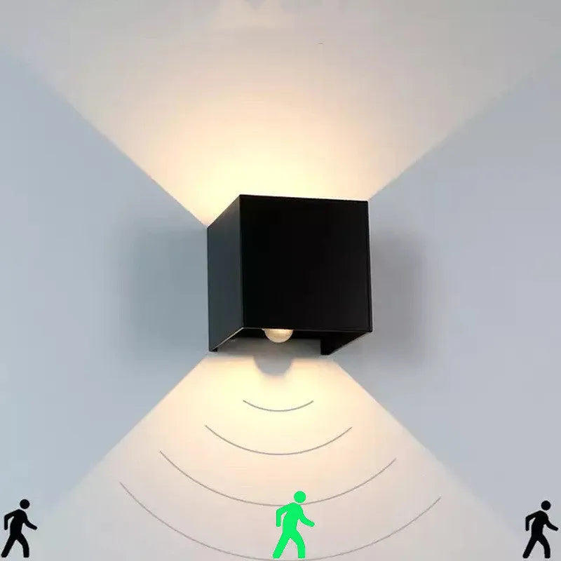 Black, grey, or white cube wall lamp with aluminium housing for corridor and garden lighting.