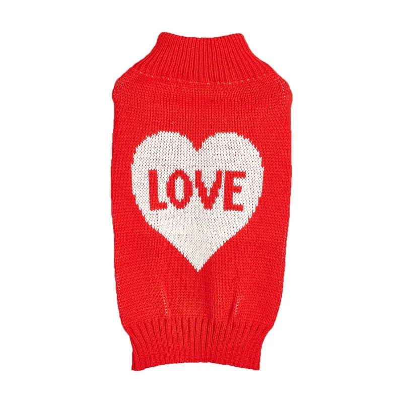 Red love heart design dog sweater on a small dog, showing acrylic knit fabric and playful motif.