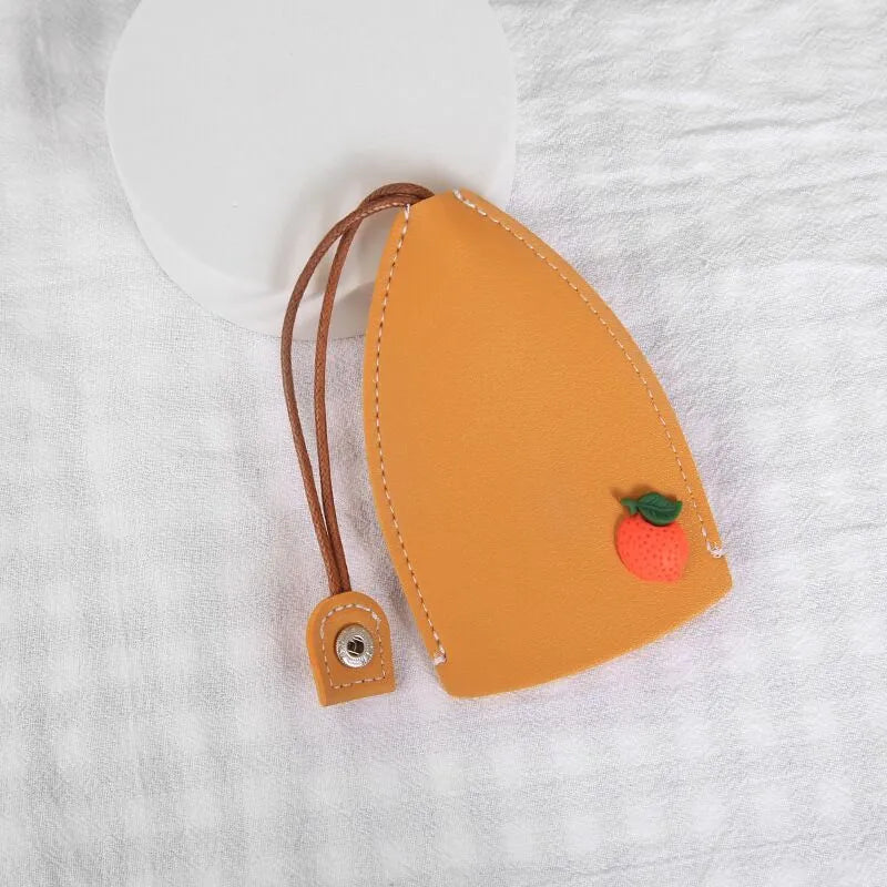 Colourful cartoon pull-out key case for car keys with PU leather construction
