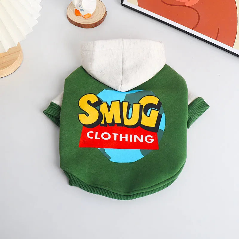 A green cotton dog jumper or sweater for large breeds, shown on a hanger.