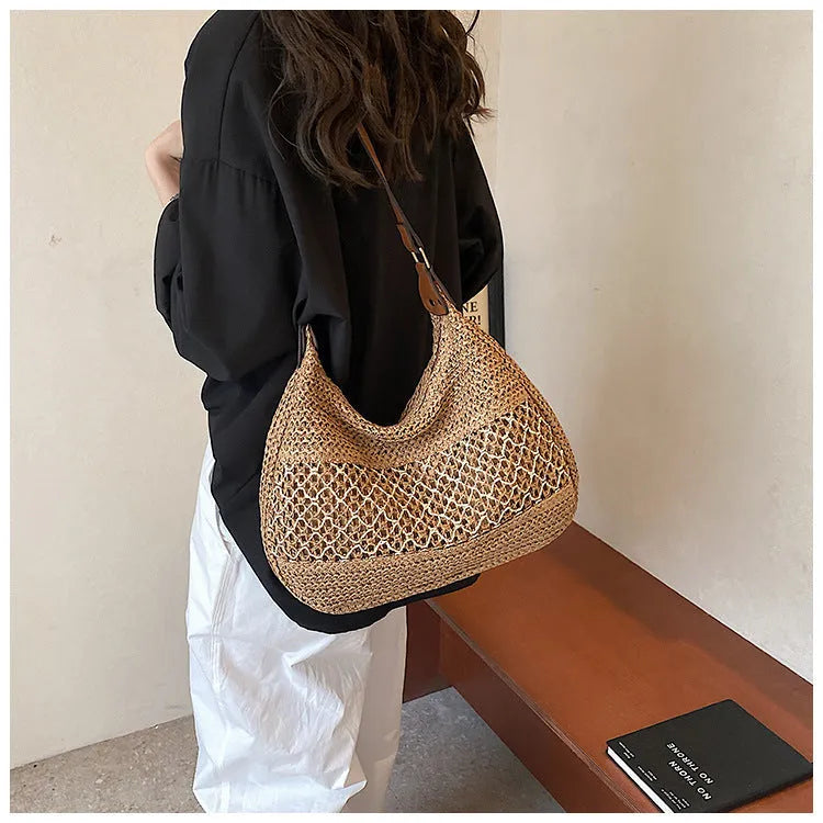 Women's straw cross body bag in khaki colour with horizontal square shape and sandwich pocket design