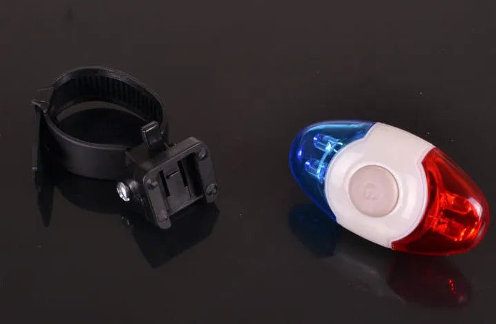 Red and blue 4 LED tail light with adjustable base for bicycle safety