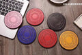 Mini Magic Array 10W wireless fast charger in a selected colour on a table.