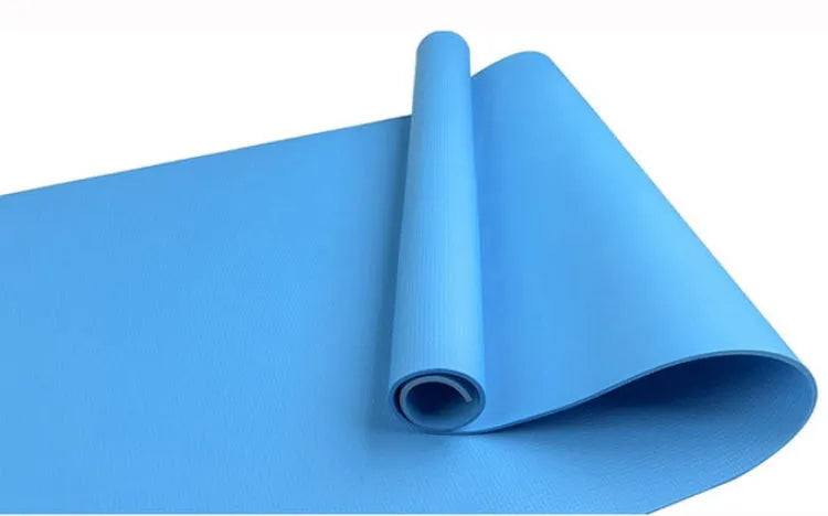 Red and blue EVA fitness yoga mats showing 4mm and 6mm thickness options on a wooden floor.