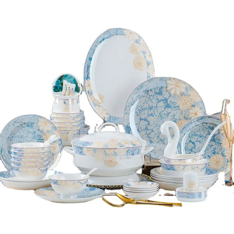 16 piece new bone china dinner set with bowls plates spoons and chopsticks on a table