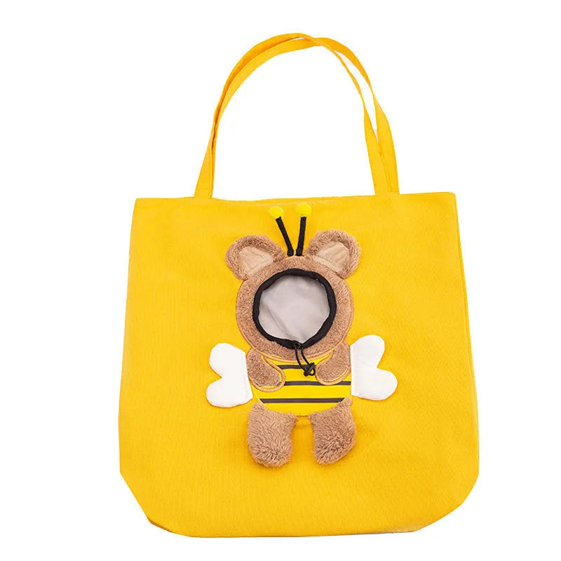 Little Bee Design canvas pet carrier shoulder bag with safety zippers and an adjustable elastic head opening for a cat or small dog.