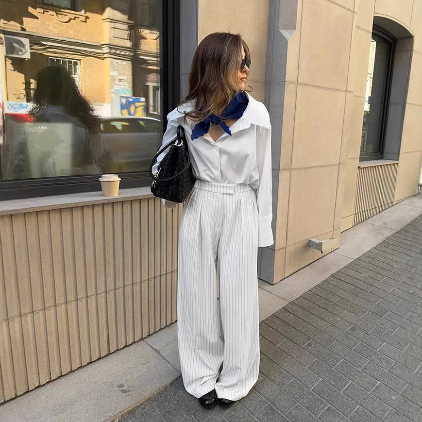 White striped wide-leg casual trousers with zipper detail shown in S/M/L sizes for commuting wear