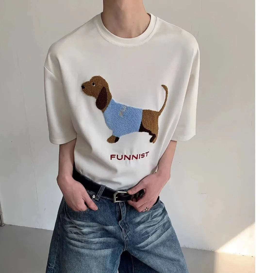 Men's grey cotton T-shirt with embroidered sausage dog design on front, round neck and short sleeves