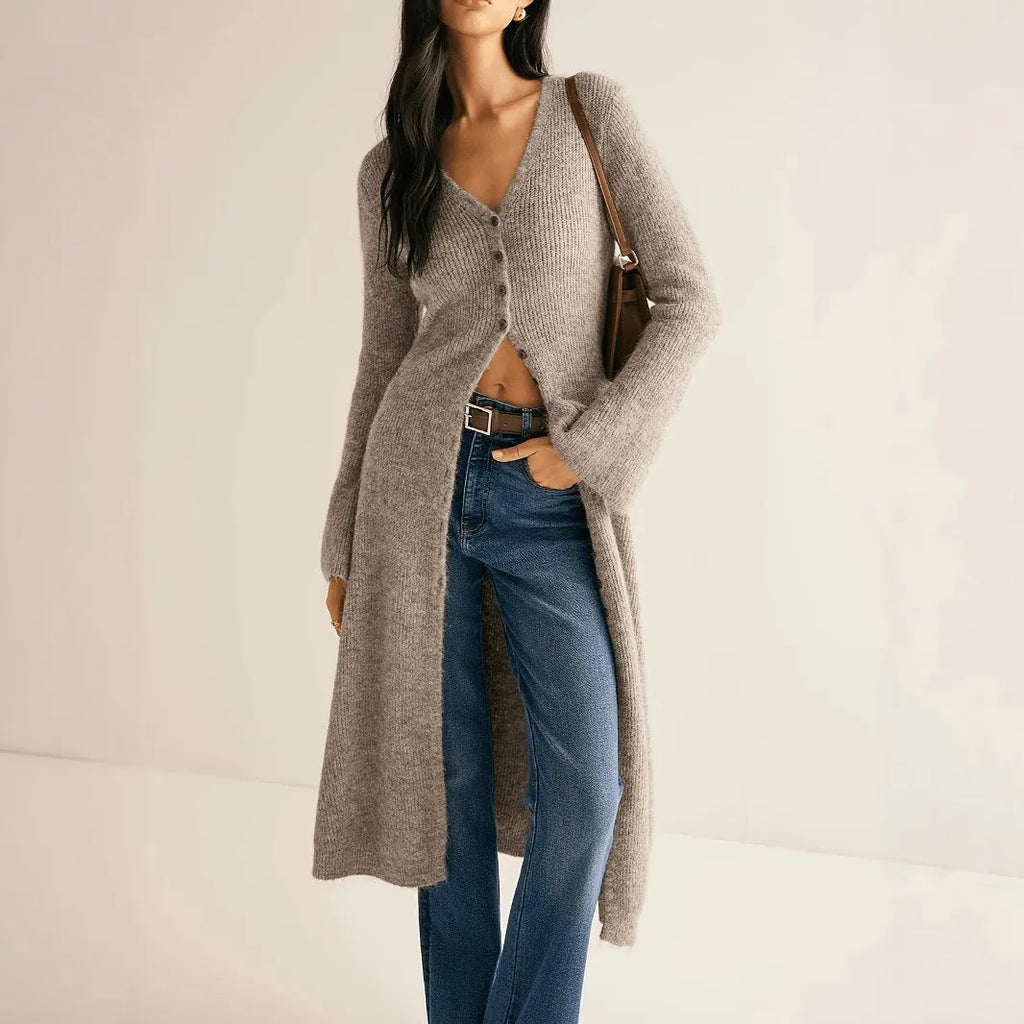 Khaki long sleeve coat cardigan with button front in a retro French style.