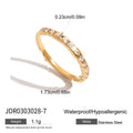 Geometric stainless steel zircon ring in European style on a grey background.