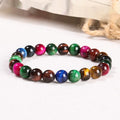 Colourful Tiger Eye women's bracelet with round beads in 6mm, 8mm, 10mm, and 12mm sizes on a mixed string.