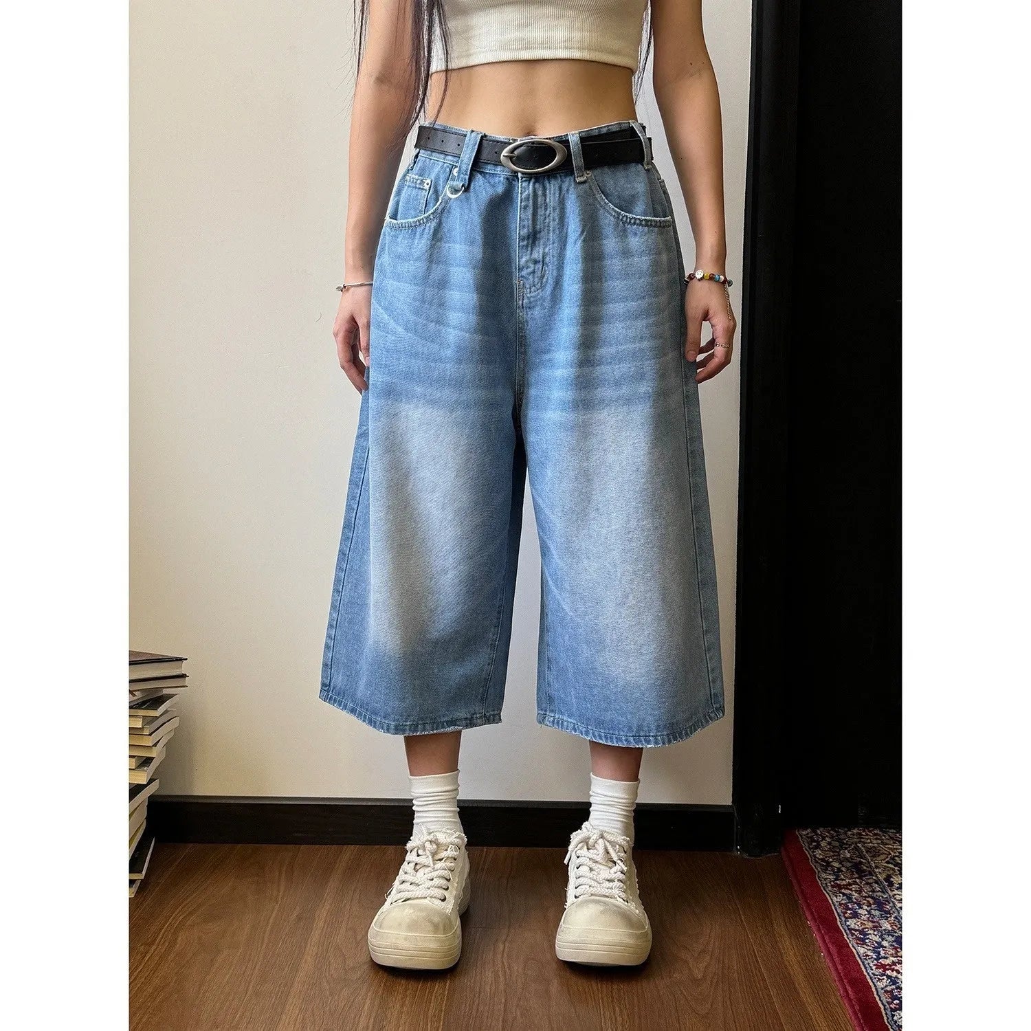 Men's straight-leg denim shorts in blue, shown with a loose fit for summer.