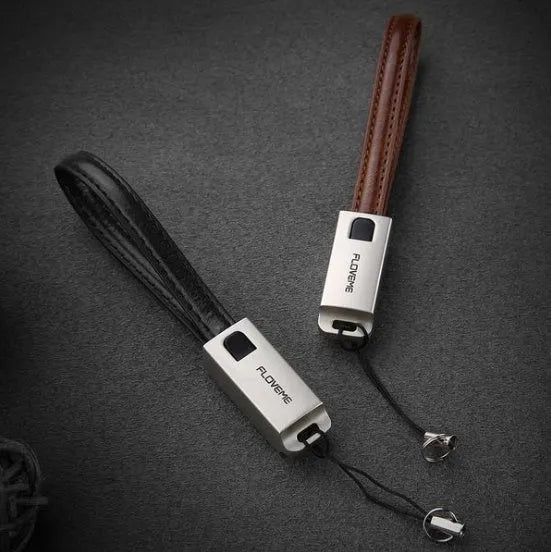 Short red leather and metal iPhone lightning charging cable showing 20cm length.