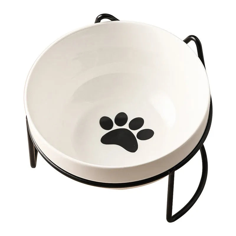 White ceramic pet bowl with decorative pattern in iron frame with cat ear accents