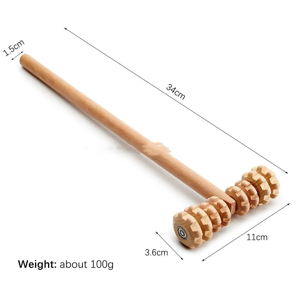 Assorted beech wood massage rollers including T-shaped and multi-wheel sets on a plain surface.