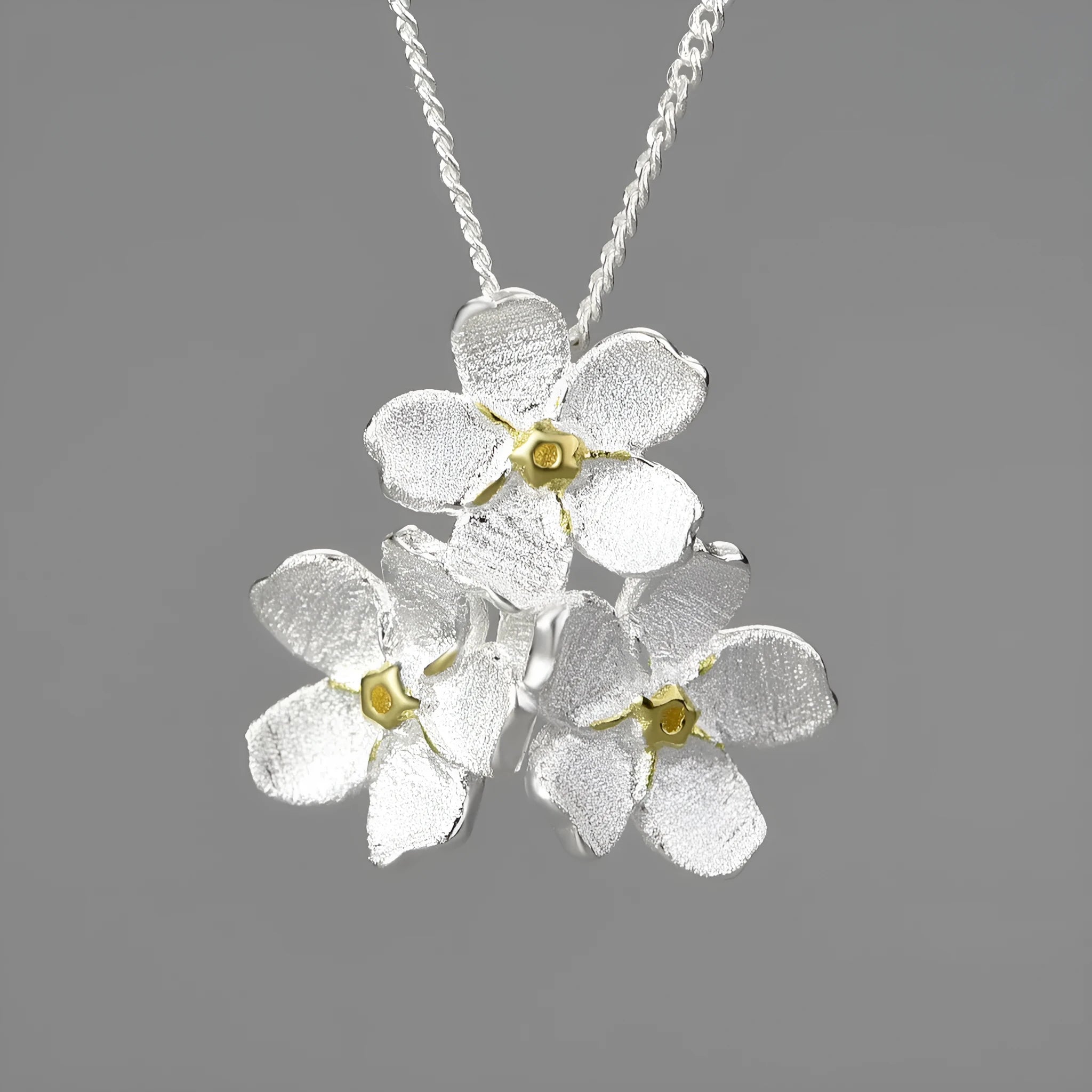 Myosotis Sylvatica sterling silver floral pendant with pastoral design in gold or silver electroplated finishes