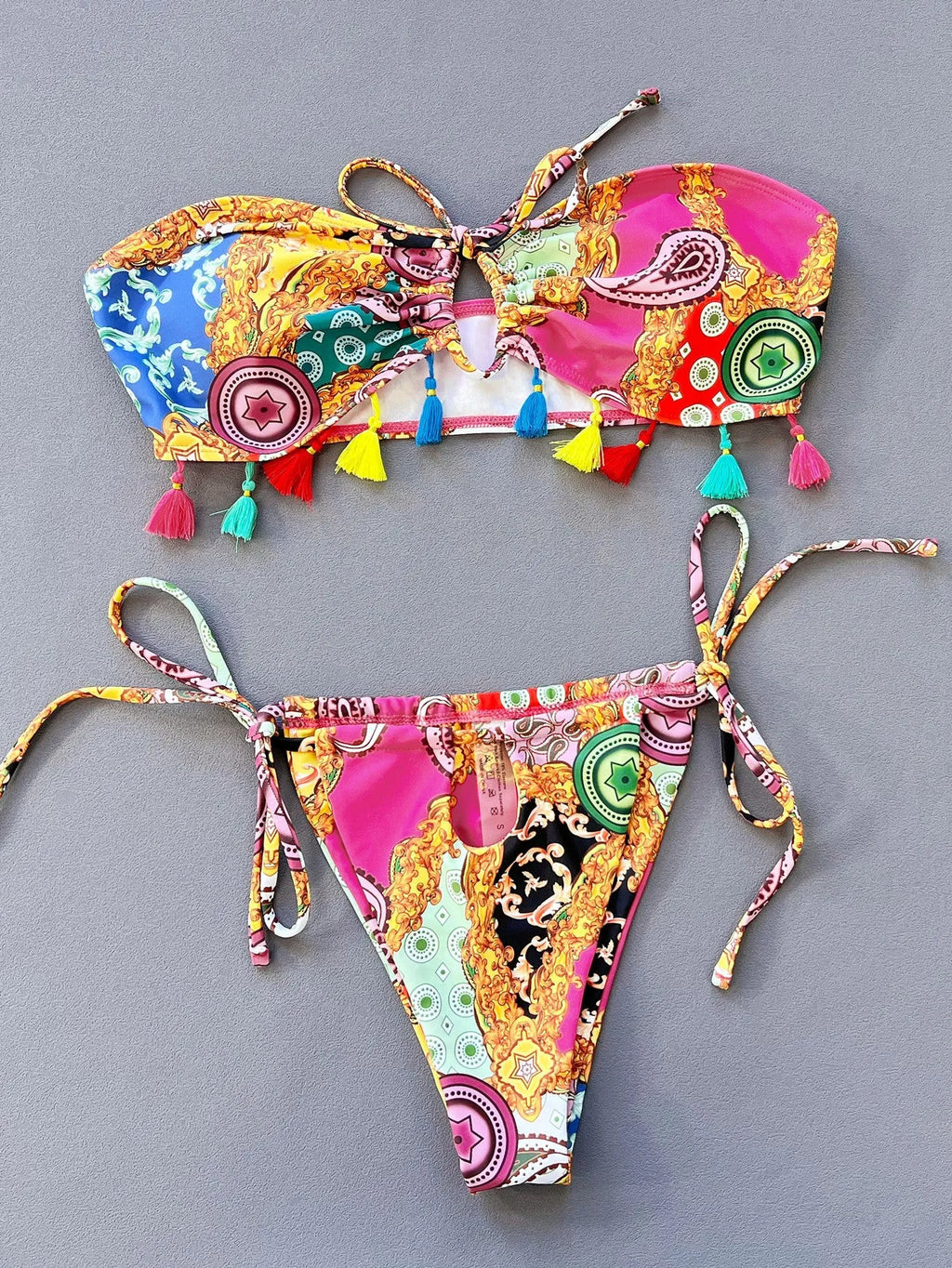 Women's printed separated tube top bikini set for swimming in blue pattern.