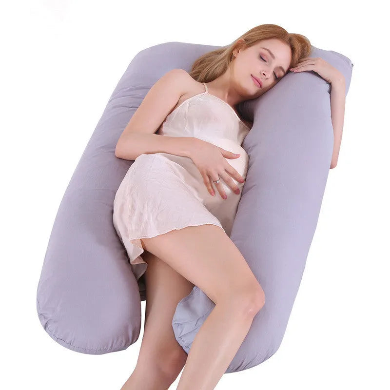 Large U-shaped pregnancy support pillow with removable cover in choice of fabrics.