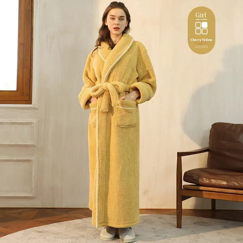 A man and woman wearing matching thickened flannel couple's bathrobes in a winter colour.