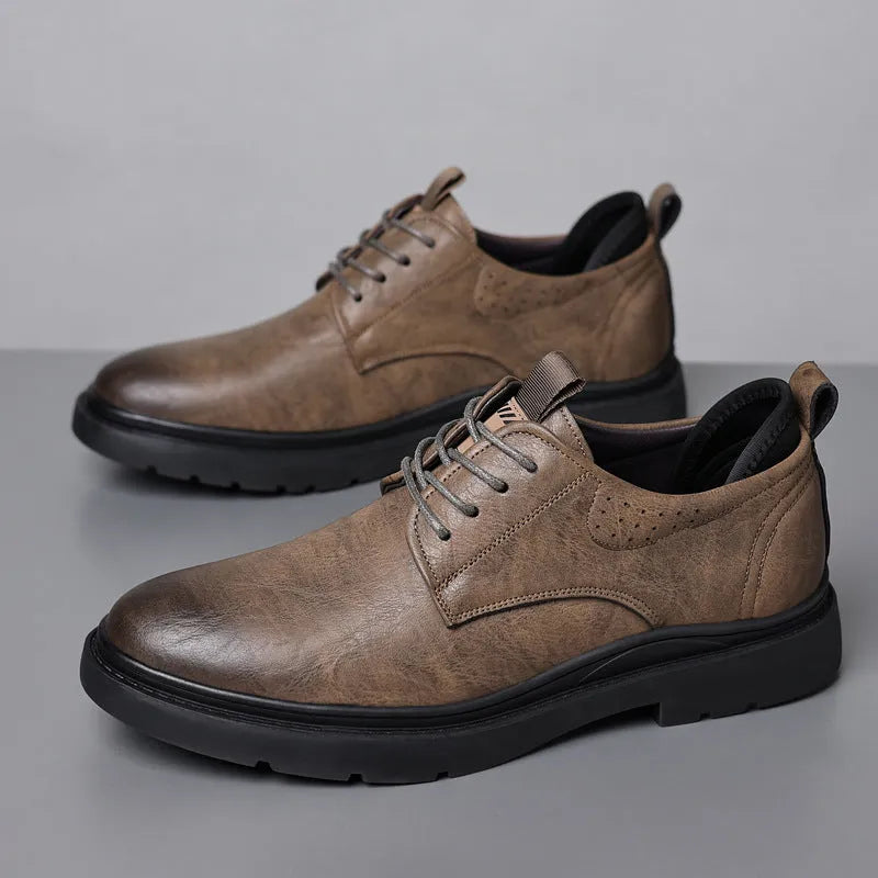 Men's black leather shoes with sewing line details and rubber sole