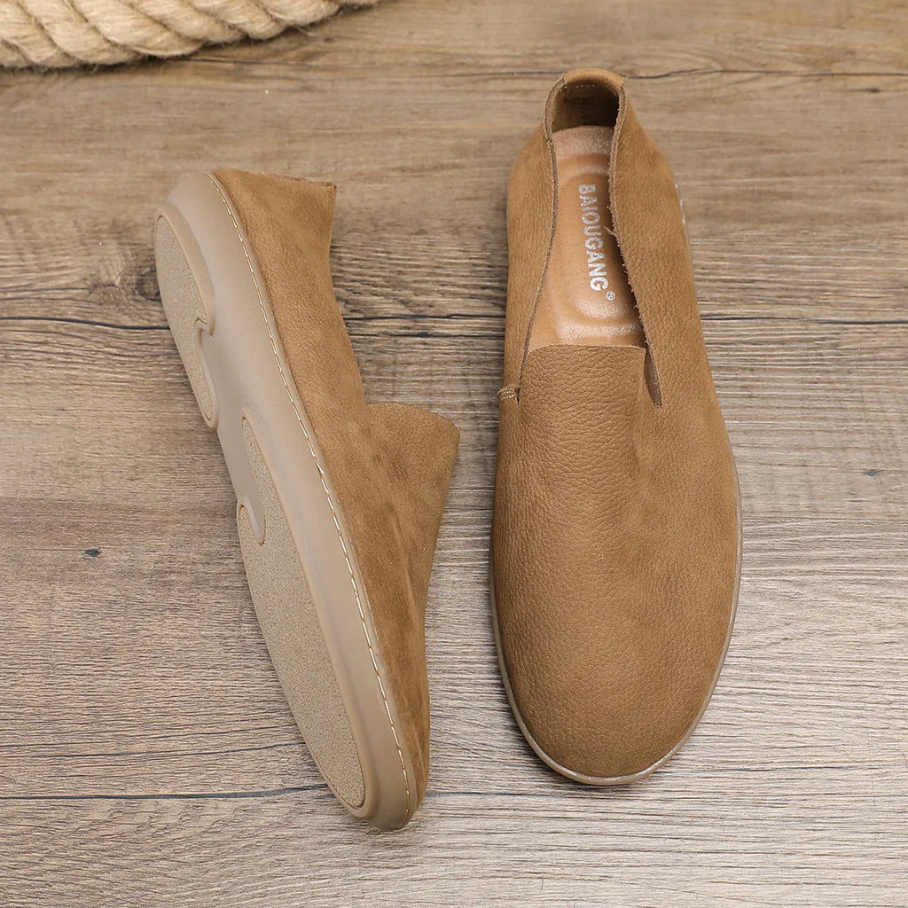 Handmade grey men's casual shoes with a wedge heel and leather upper.